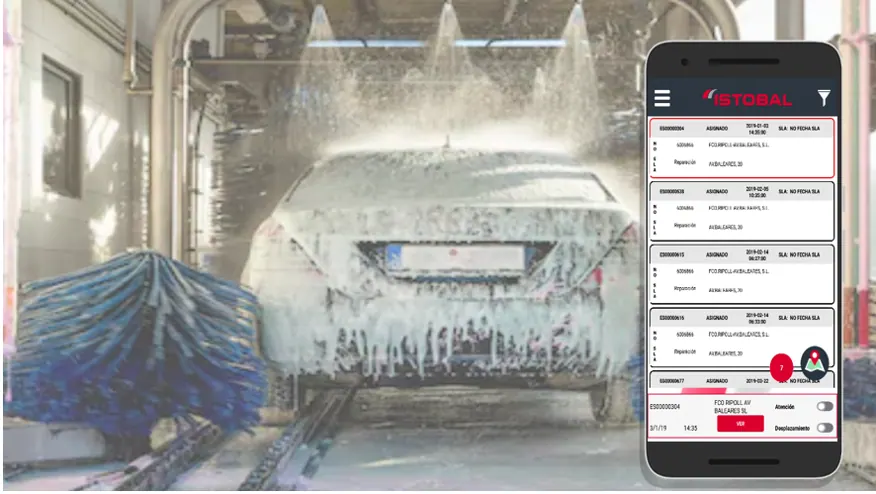 Istobal's iSAT app showing the list of technical service requests, over a vehicle wash tunnel